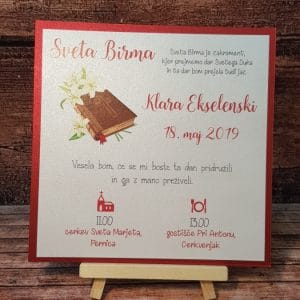 Vabilo za BIRMO zalepljeno na rdečem papirju z rdečo pisavo in biblijo