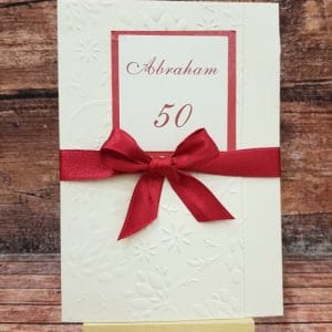 Vabila za Abrahama z rdečo pentljo in elegantnim motivom na papirju