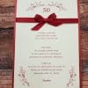 Vabilo za Abrahama z rdečo pentljo in rdečim cvetličnim motivom